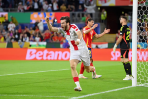 Khvicha Kvaratskhelia of Georgia celebrates after Robin Le Normand of Spain (not pictured) scores an own goal Image Credit: gettyimages