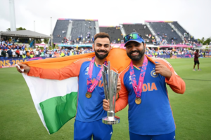 Virat Kohli and Rohit Sharma of India celebrates with the ICC Men's T20 Cricket World Cup