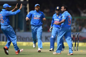 India's Amit Mishra (R) celebrates with teammates Suresh Raina (2L) and Rohit Sharma (L) captain Mahendra Singh Dhoni (2R) during the first one day international (ODI) cricket match between India and South Africa at Green Park Stadium in Kanpur on October 11, 2015. Credit: gettyimages